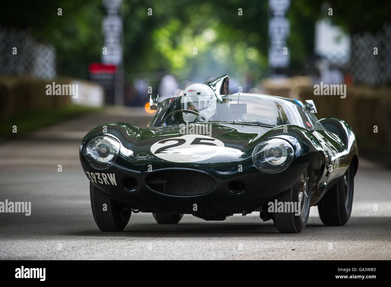 A Jaguar D-Type Long-Nose drives up the hill at the Goodwood Festival of Speed 2016 Stock Photo