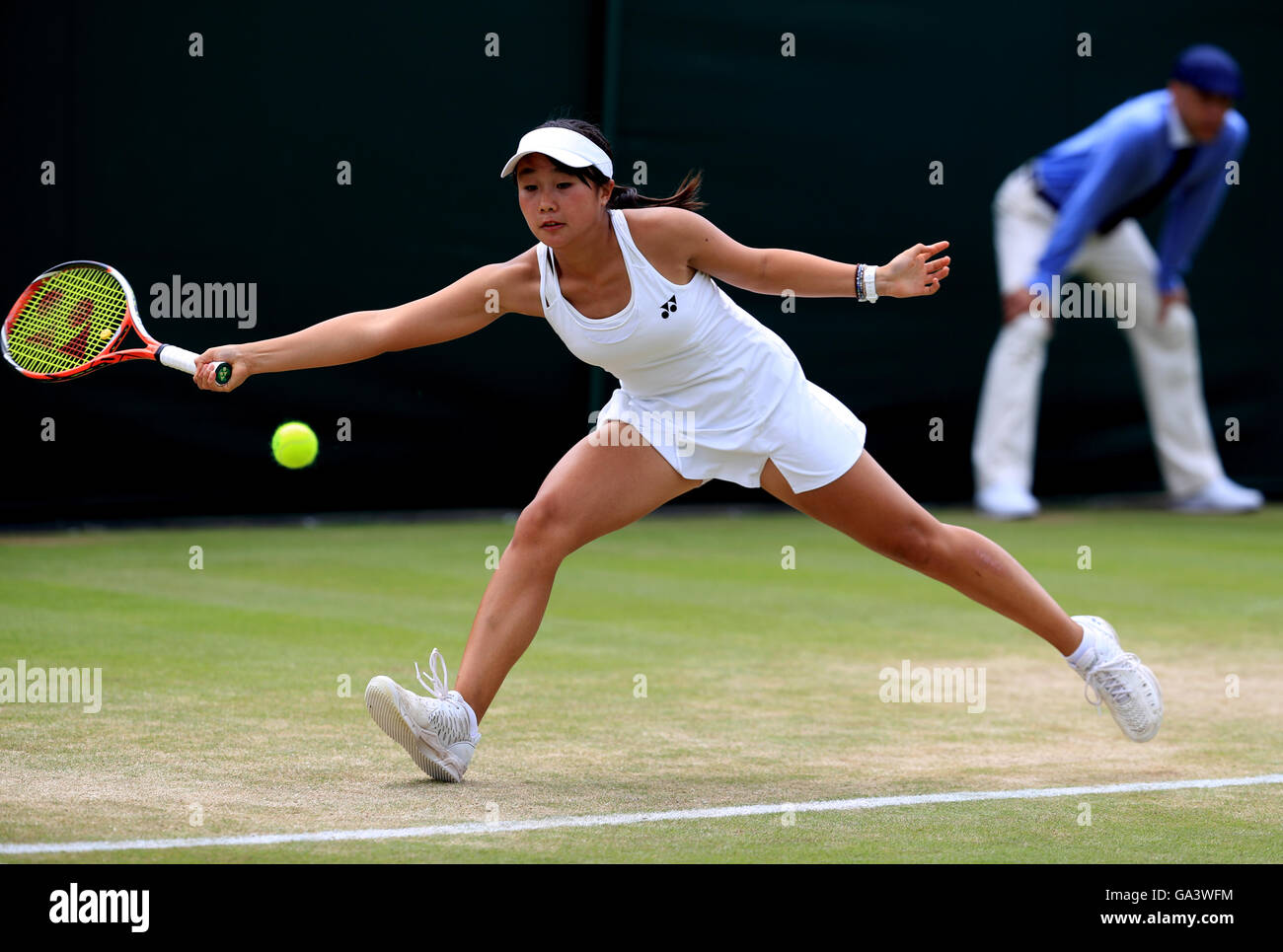 Yuki Naito in action against Anastasia Zarytska on day seven of the  Wimbledon Championships at the All England Lawn Tennis and Croquet Club,  Wimbledon Stock Photo - Alamy