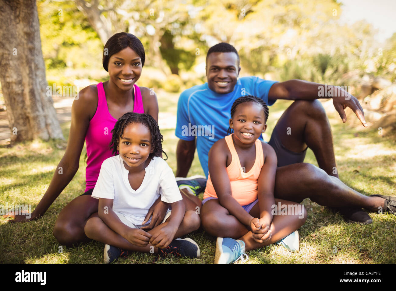 Happy family posing together Stock Photo - Alamy