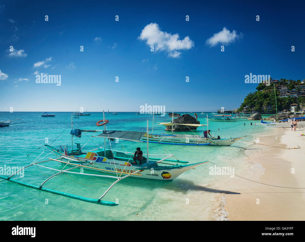tourist water taxi tour boats in paradise diniwid beach boracay philippines Stock Photo
