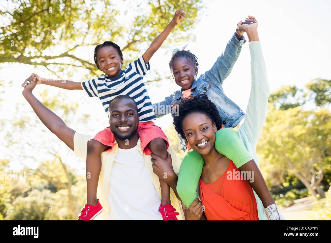 Happy family posing together Stock Photo - Alamy