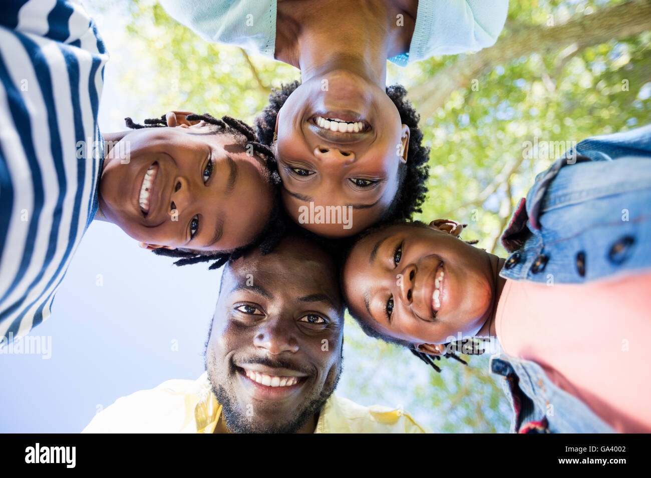 Happy family posing together Stock Photo - Alamy