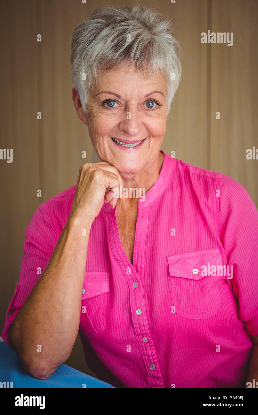 Portrait of a smiling retired woman Stock Photo