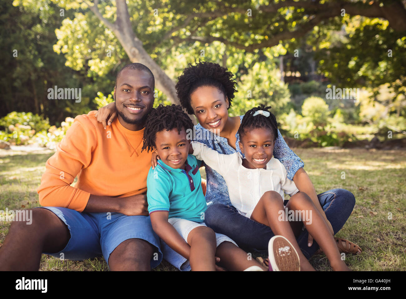 Happy family posing together Stock Photo - Alamy