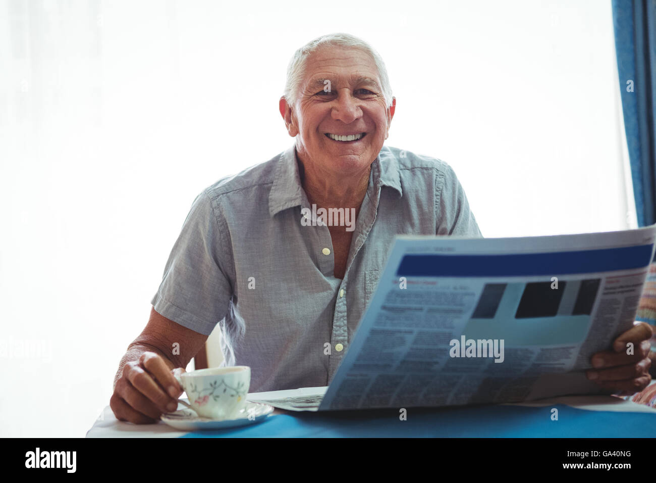 Retired man sitting looking camera hi-res stock photography and images ...
