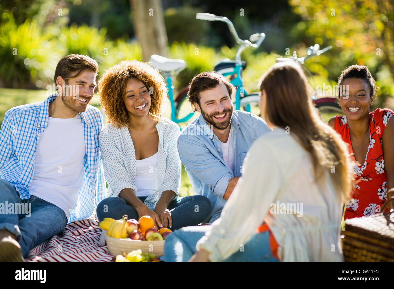 Friends having fun in park Stock Photo - Alamy