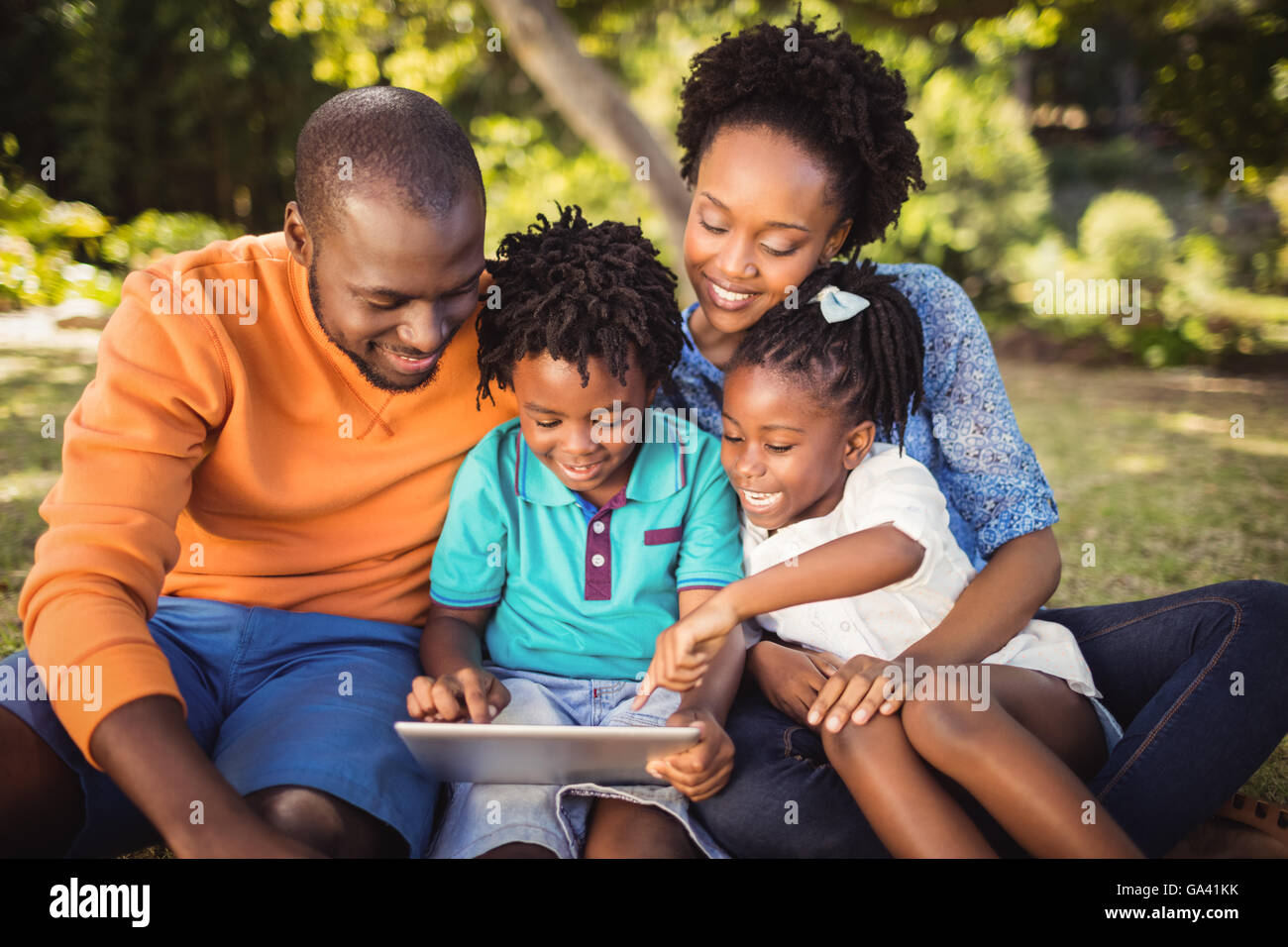 Happy family posing together Stock Photo - Alamy