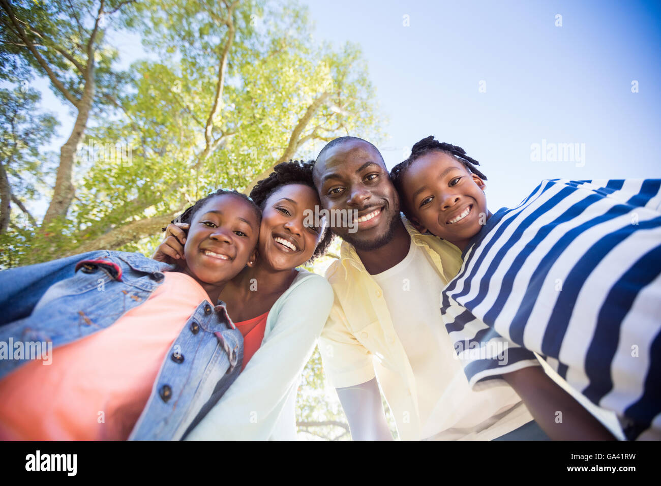 happy family posing together Stock Photo - Alamy