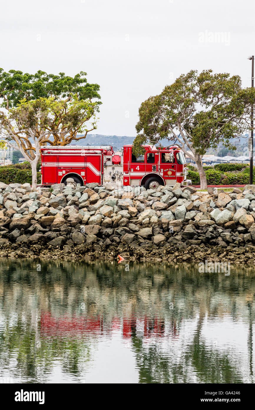 San Diego Fire Truck and Reflection in Harbor Stock Photo
