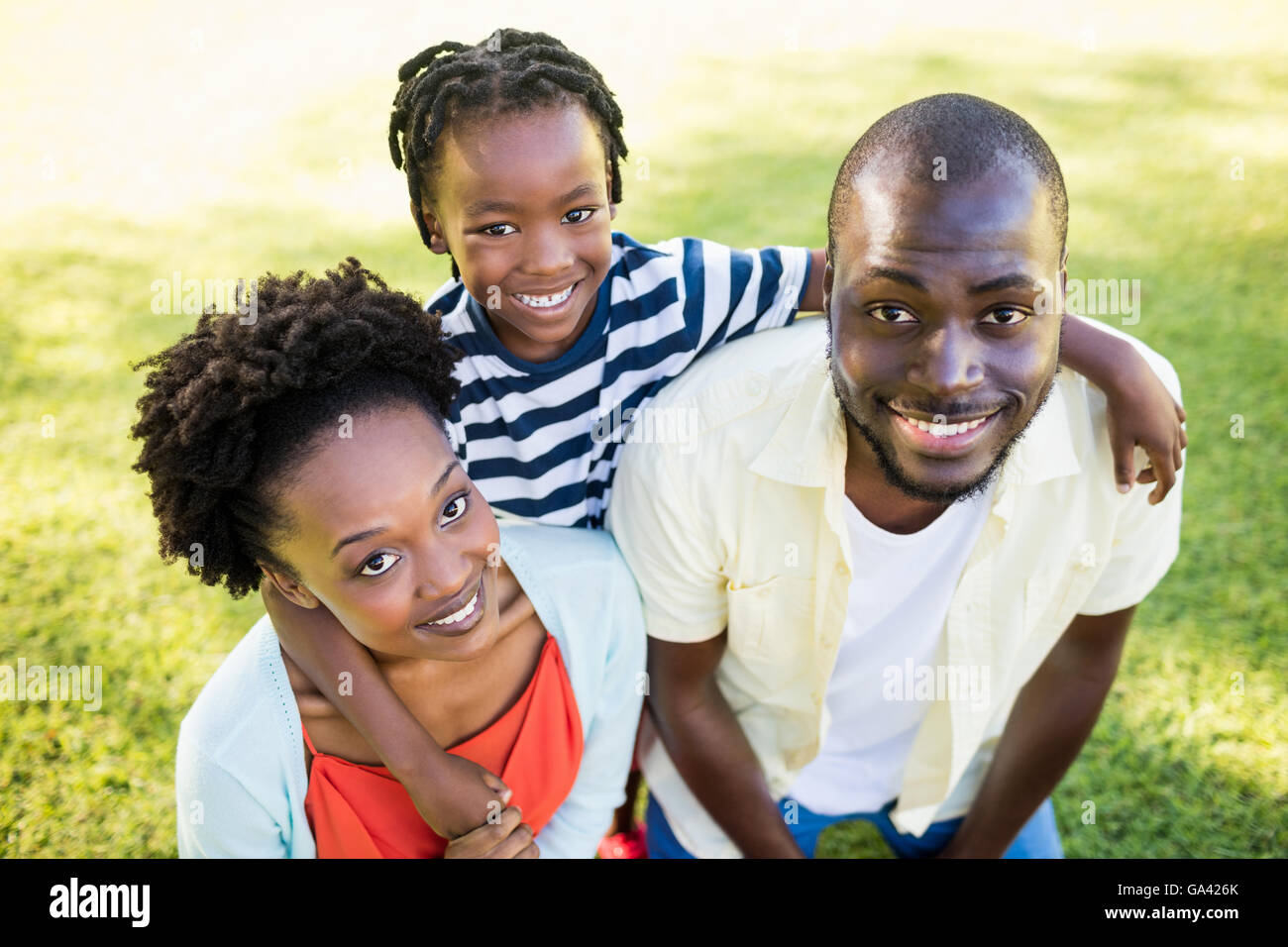 Happy family posing together Stock Photo - Alamy