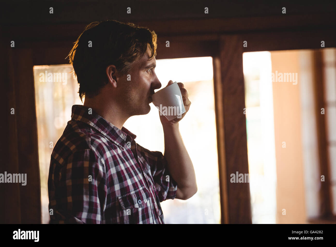Man drinking a coffee alone Stock Photo