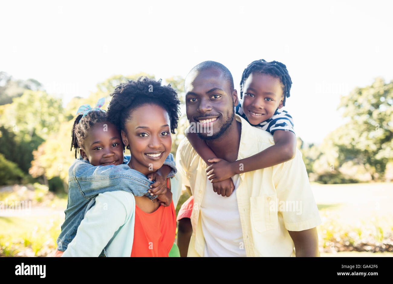 Happy family posing together Stock Photo - Alamy