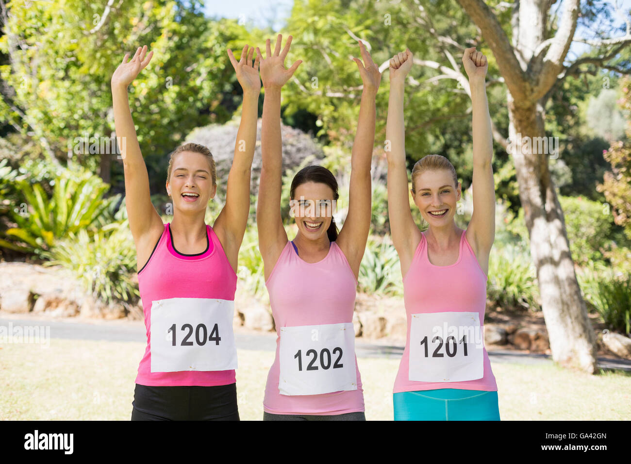 Young athlete women posing after victory Stock Photo