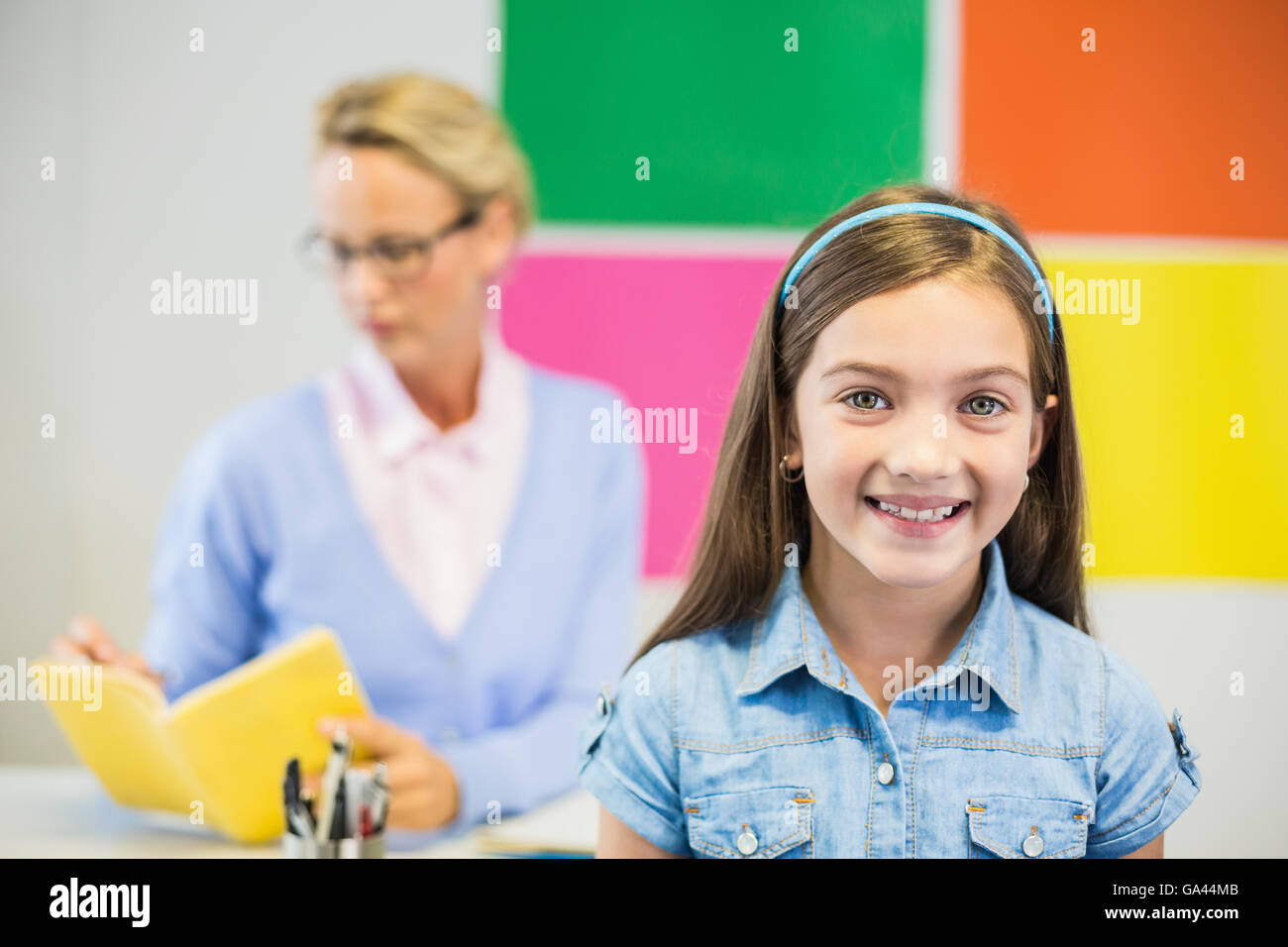 Portrait of schoolgirl in classroom Stock Photo - Alamy
