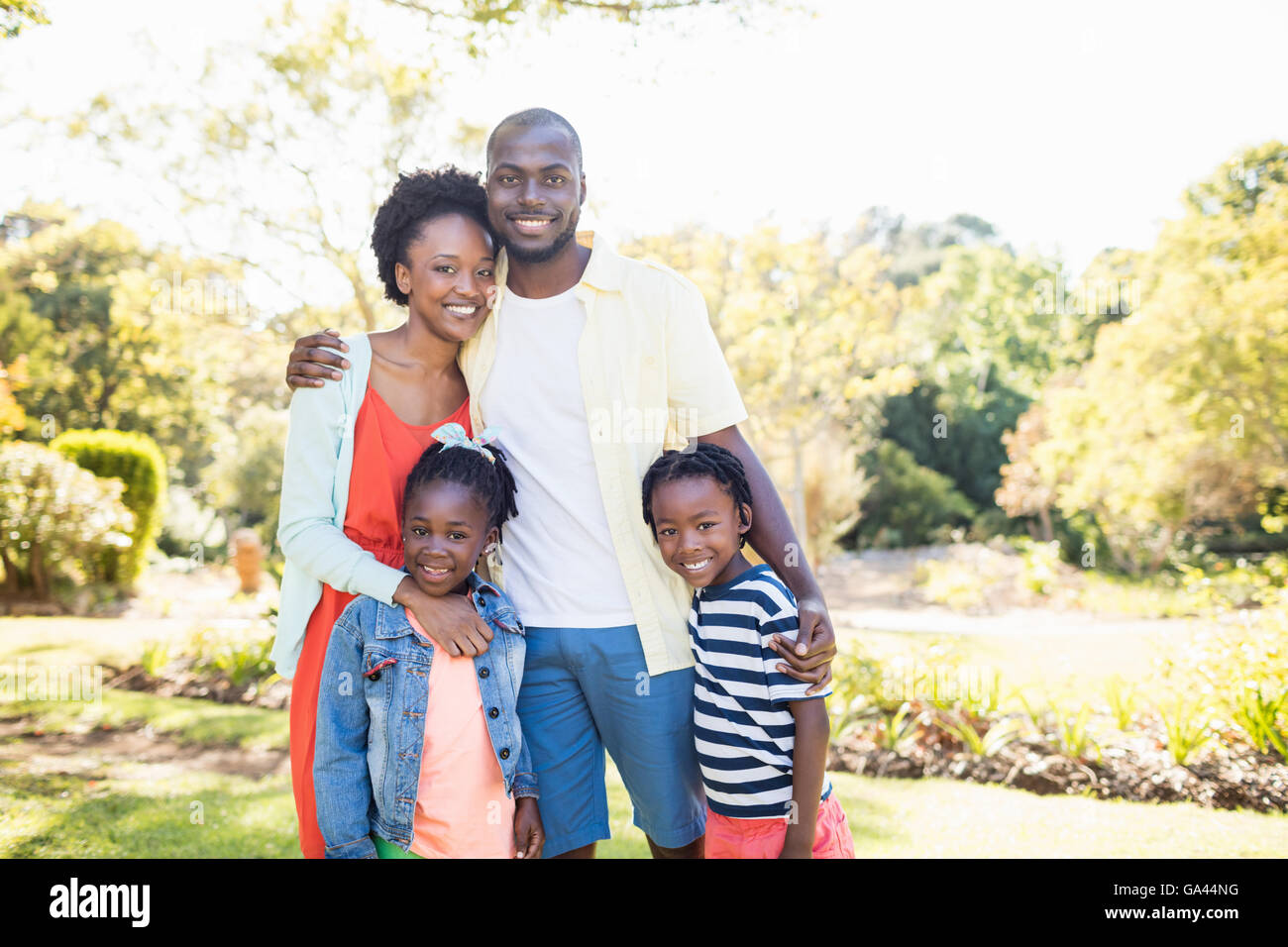 Happy family posing together Stock Photo - Alamy