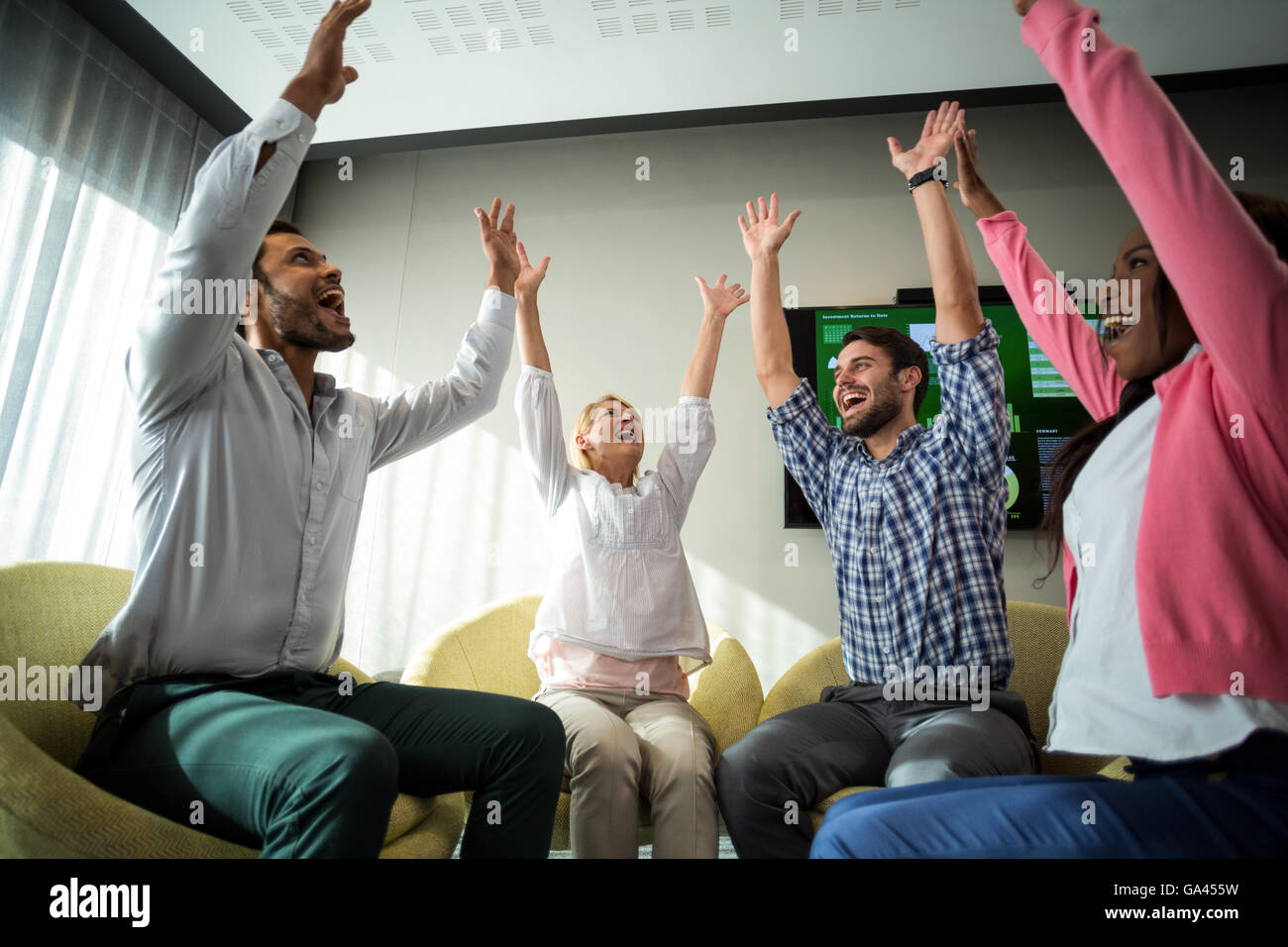 Business people raising their arms Stock Photo - Alamy