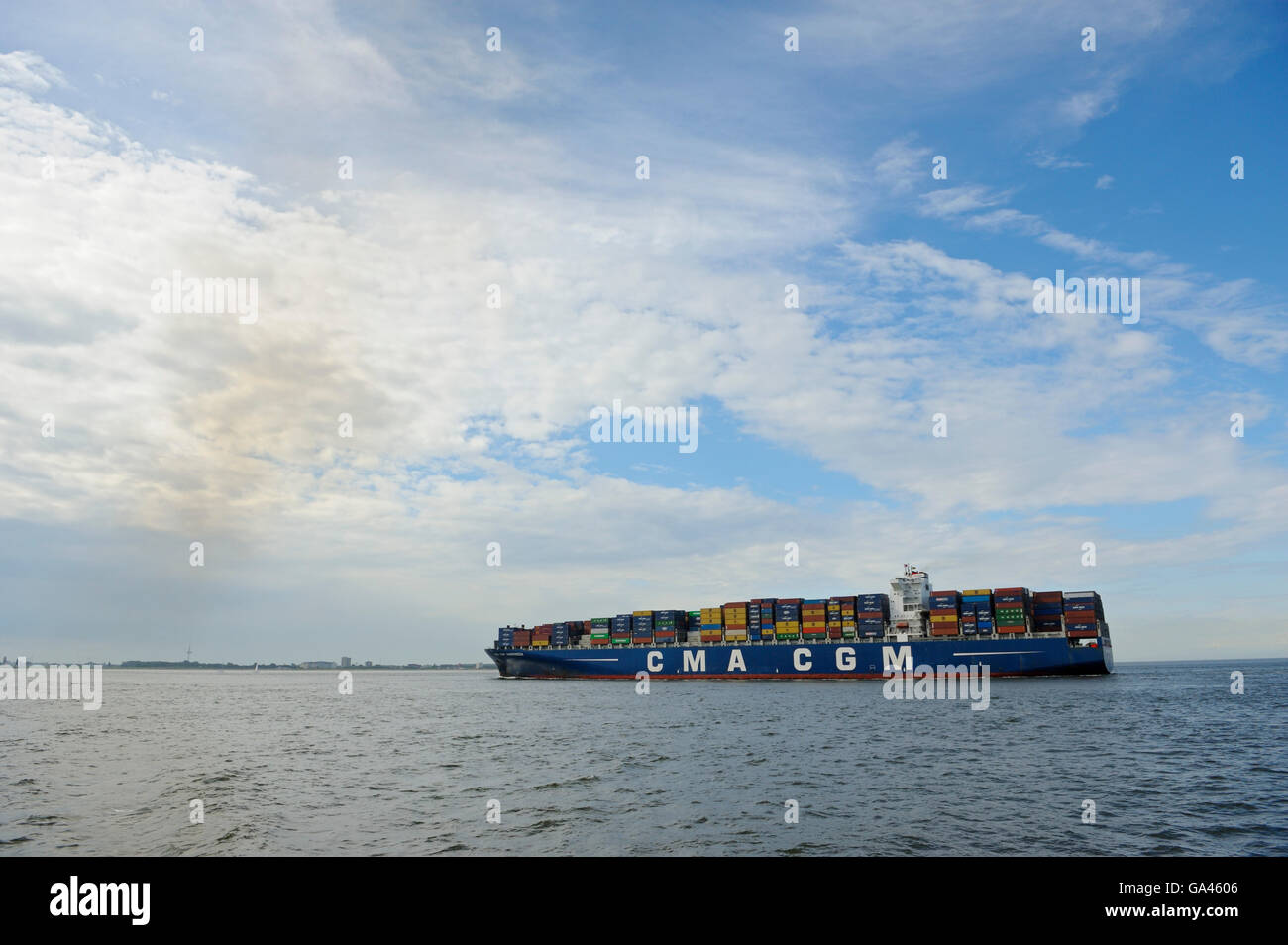 Container ship at the river Elbe, Cuxhaven, Germany Stock Photo