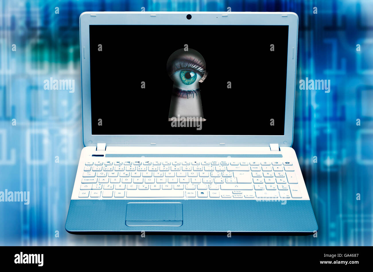 eye observing from keyhole in monitor, hacking and danger in internet Stock Photo