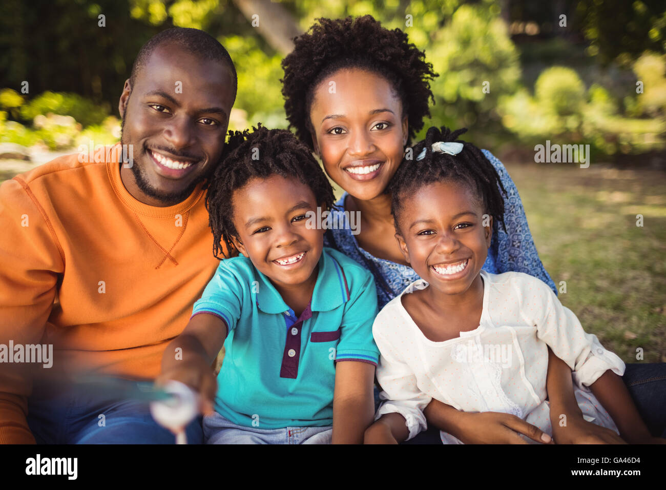 Happy family posing together Stock Photo - Alamy