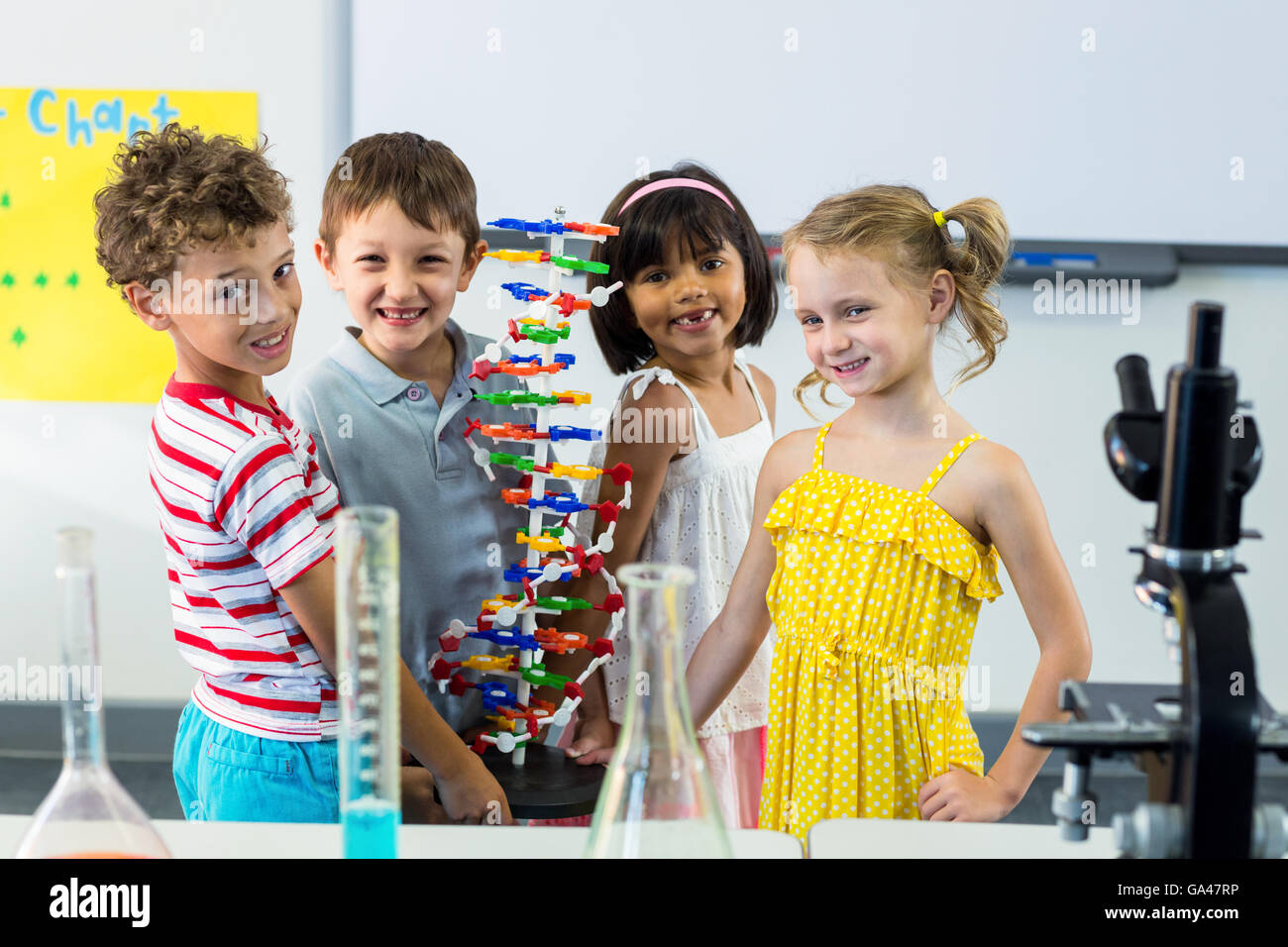 Portrait of children with scientific equipment Stock Photo - Alamy