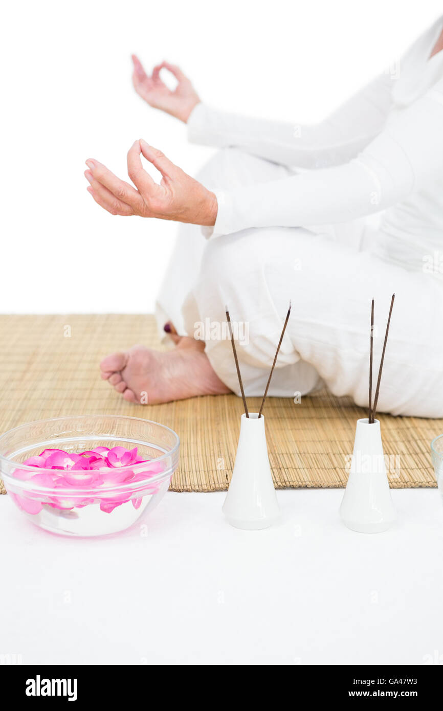 Low section of woman meditating Stock Photo