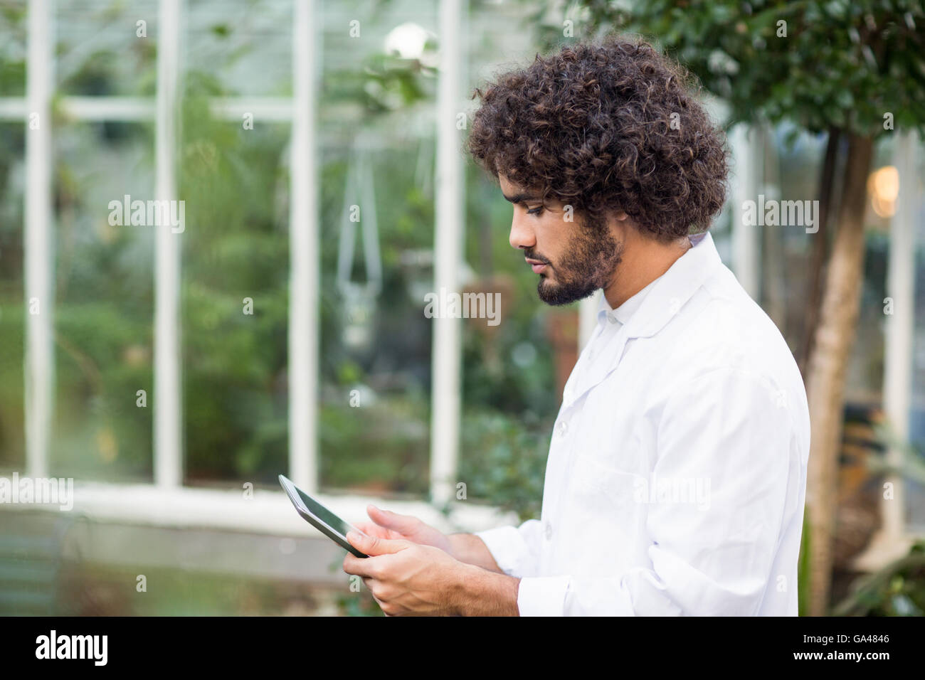 Male scientist using digital tablet Stock Photo