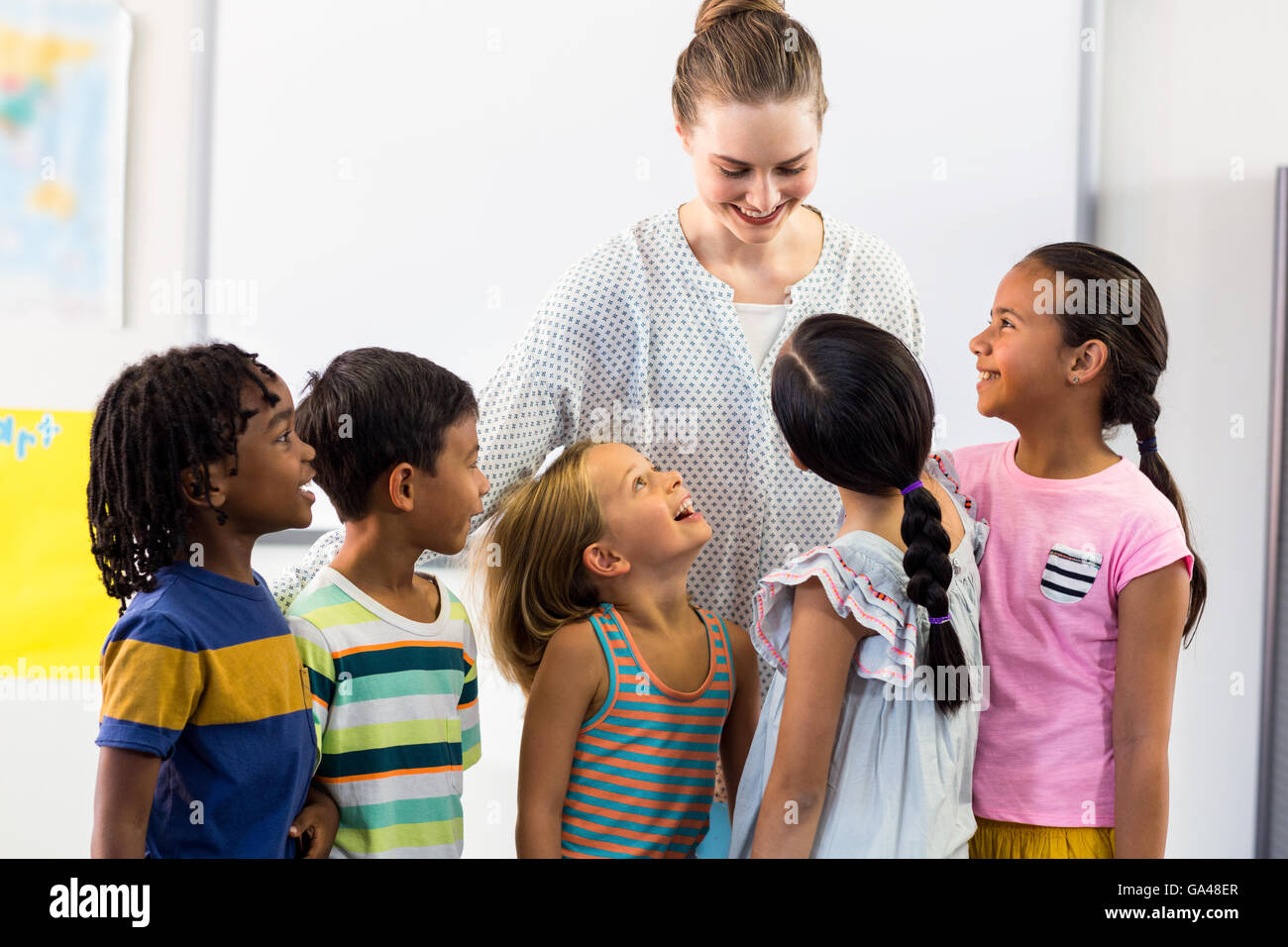 female teacher with schoolchildren Stock Photo