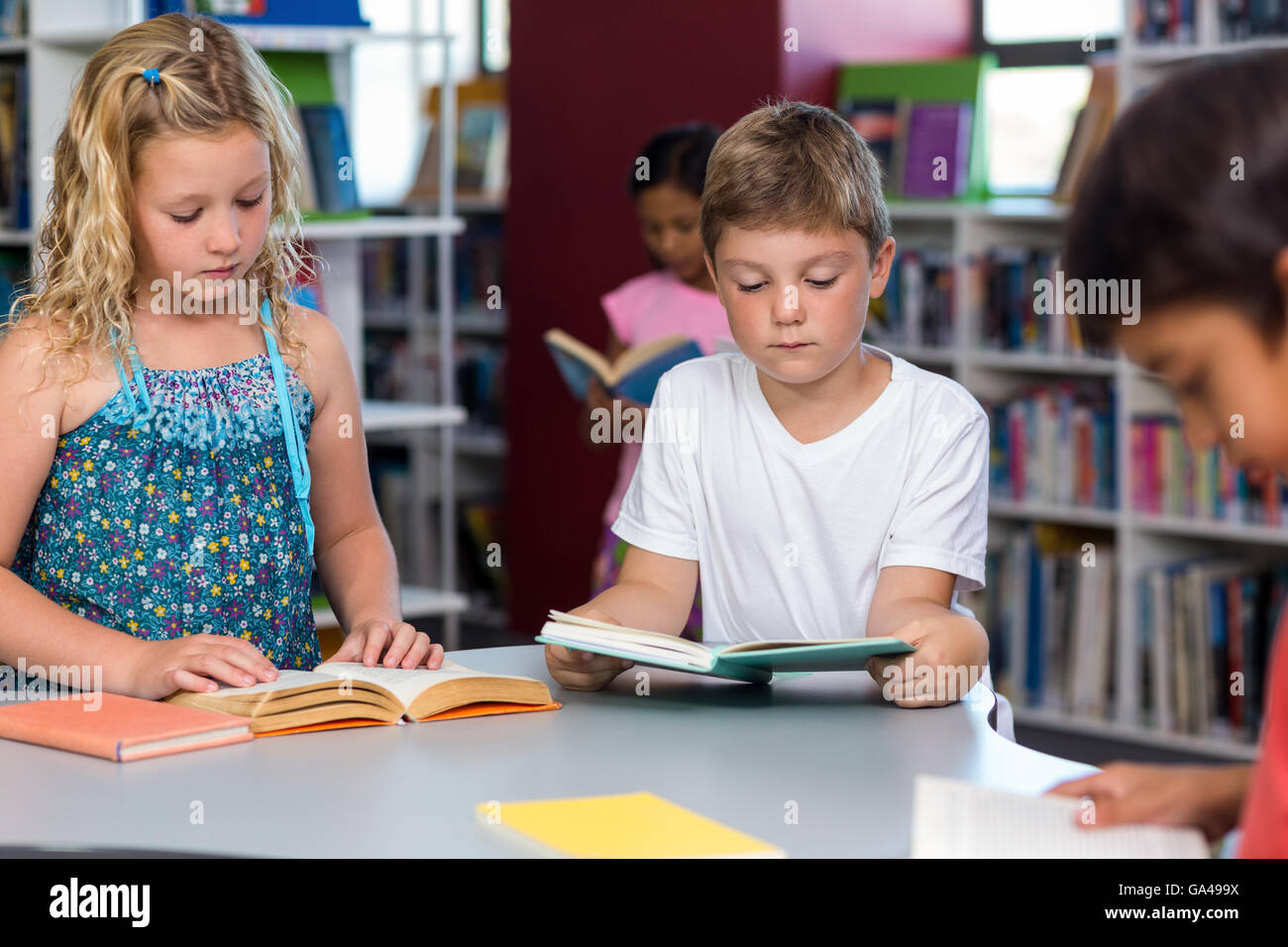 Children reading books Stock Photo Alamy
