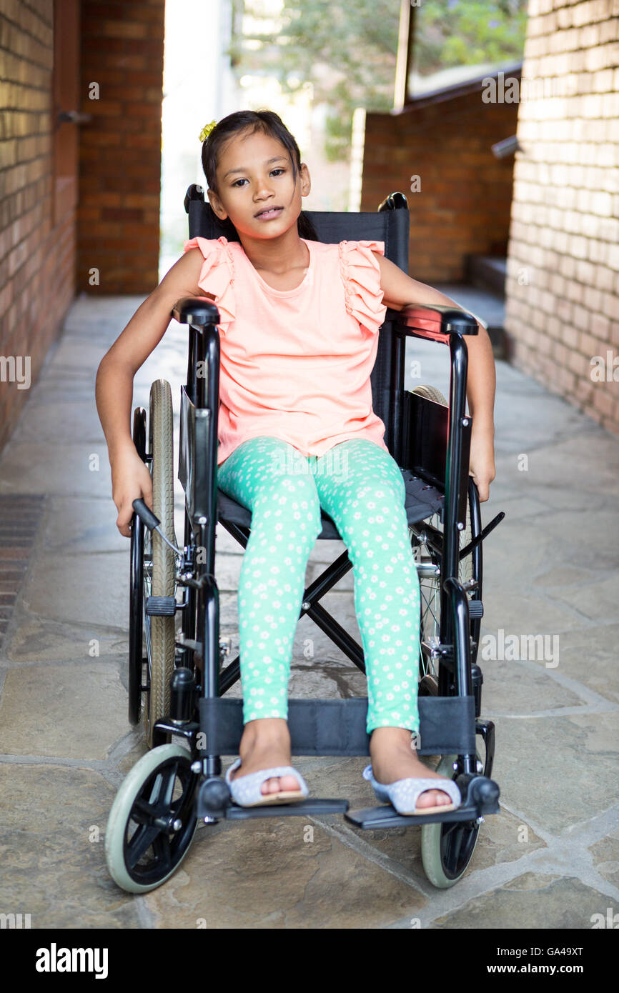 Handicapped girl at school corridor Stock Photo Alamy
