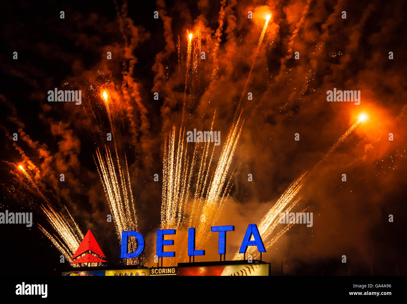 Friday night fireworks above the Delta Air Lines sign at Turner Field in Atlanta Georgia after an Atlanta Braves baseball game. Stock Photo
