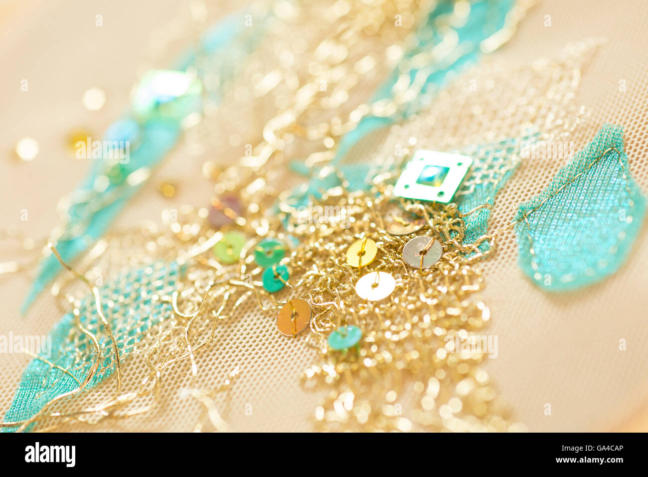 Gold thread with sequins clothing design embroidery Stock Photo Alamy
