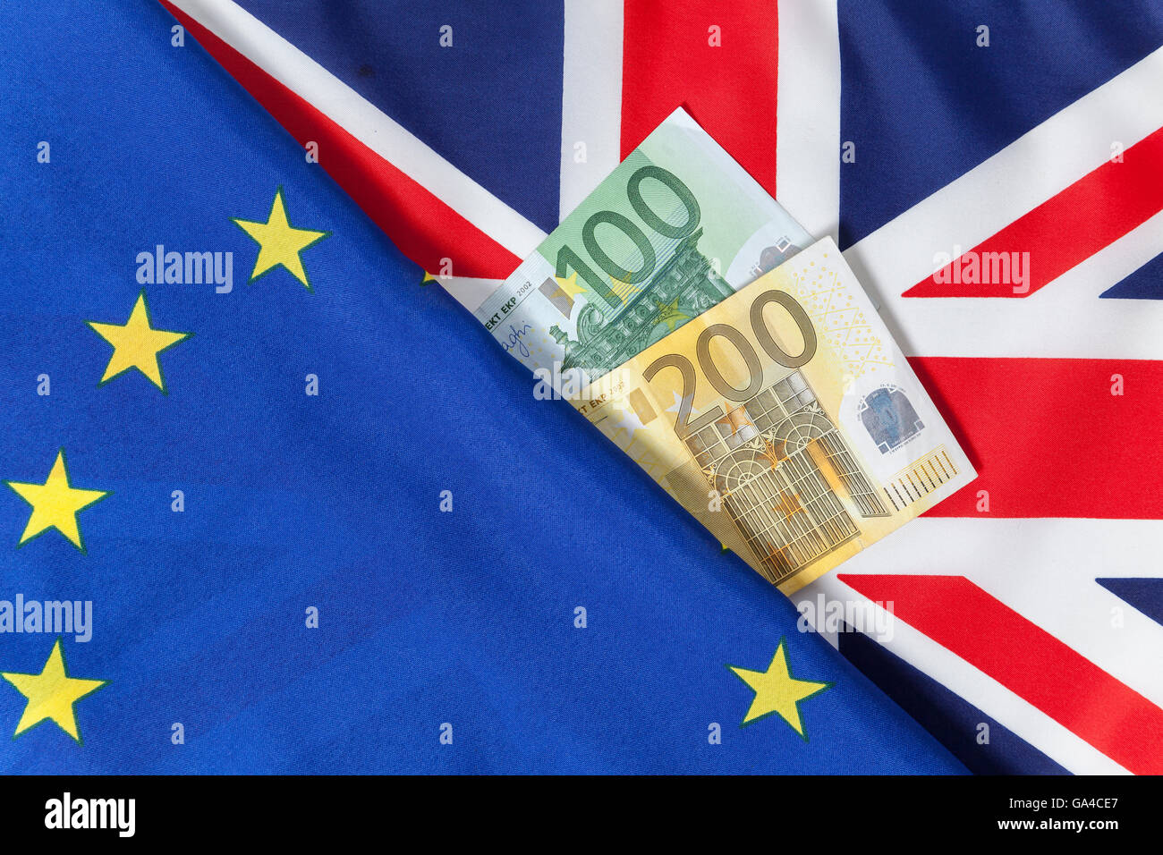 EU, GB flag and Euro money notes Stock Photo