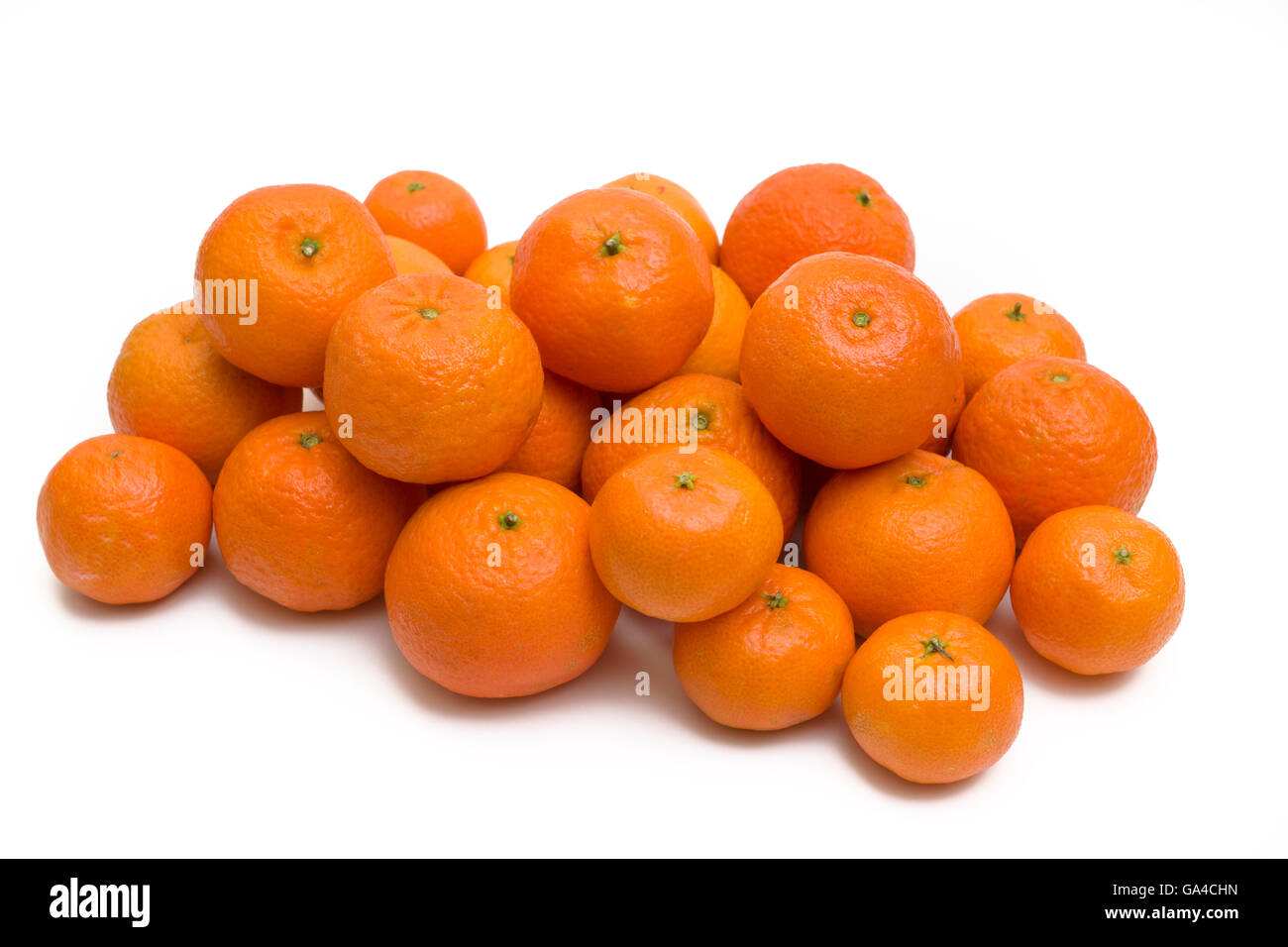 Hill ripe tangerines on a white background Stock Photo