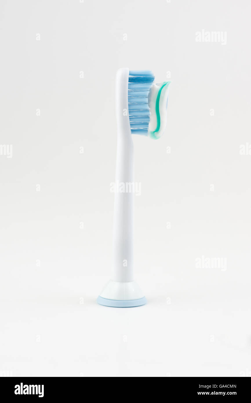 attachment for an electric toothbrush with toothpaste Stock Photo