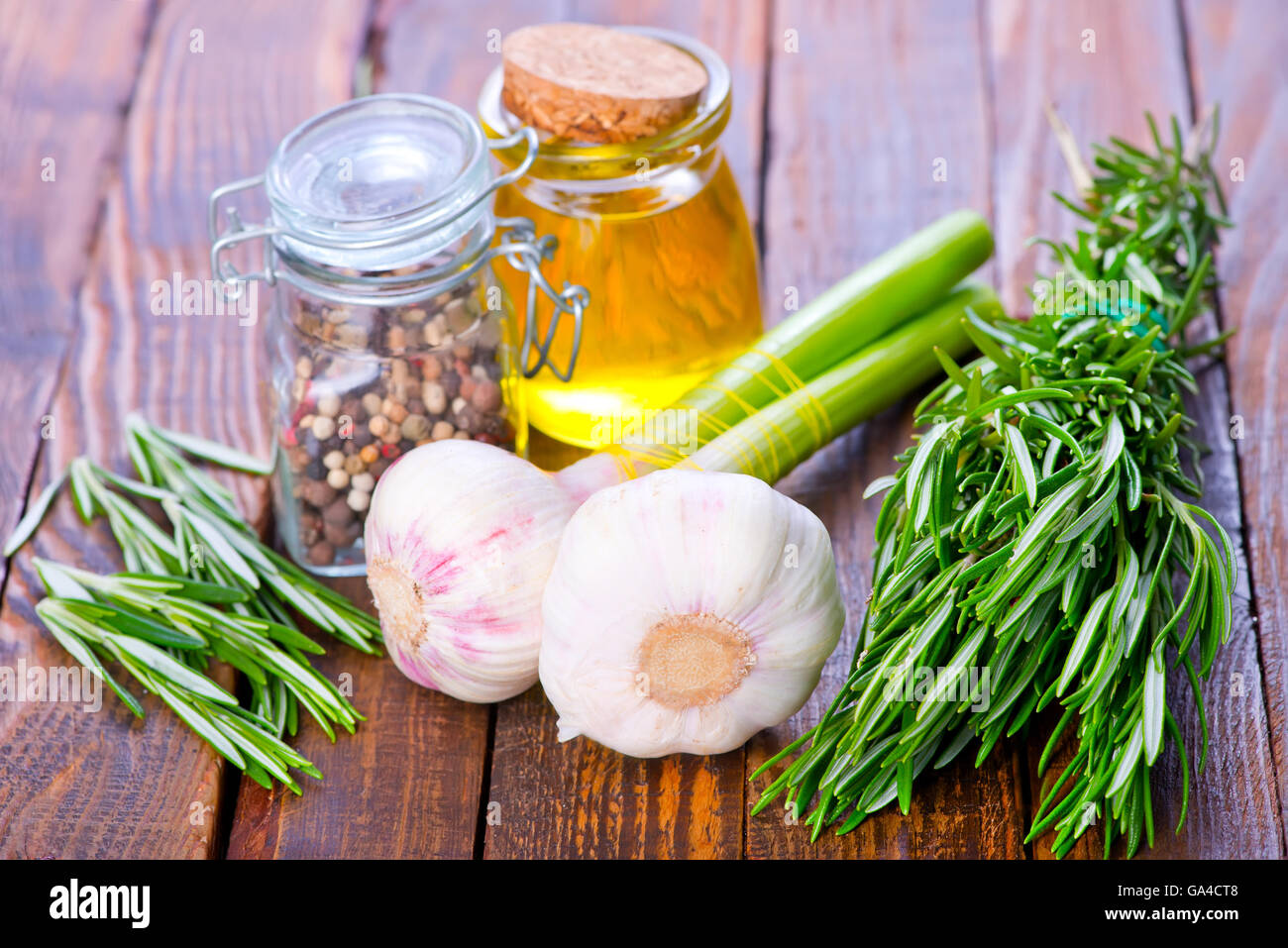 garlic and aroma herb on the table Stock Photo - Alamy