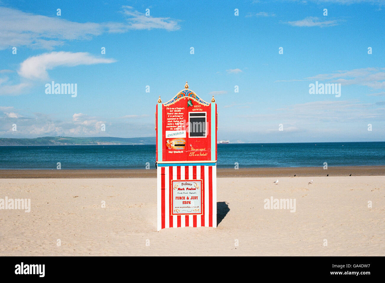 Punch and Judy show with no-one present at the beach at Weymouth, Dorset, in June Stock Photo