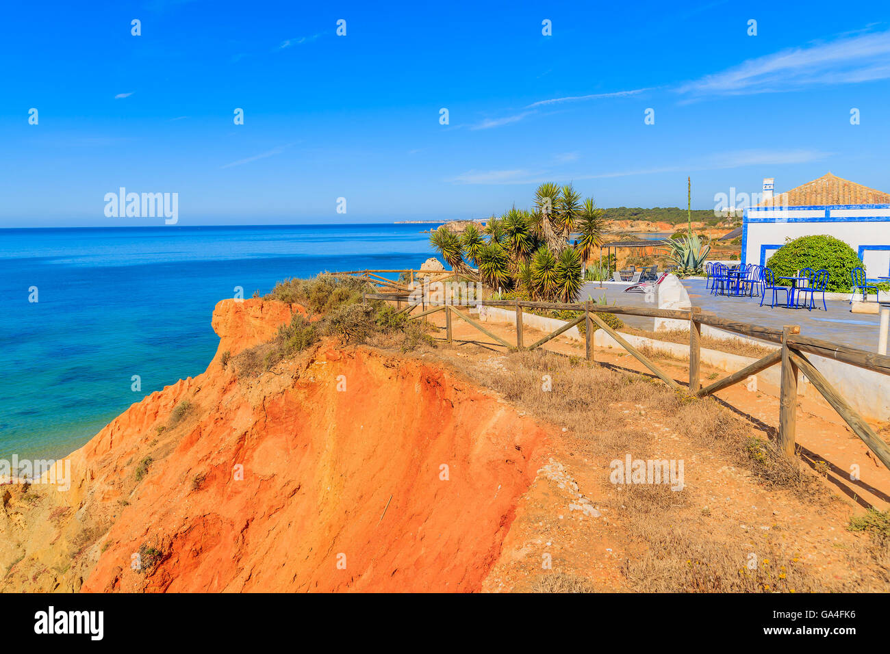 Typical house on top of cliff in Portimao seaside town, Algarve region, Portugal Stock Photo