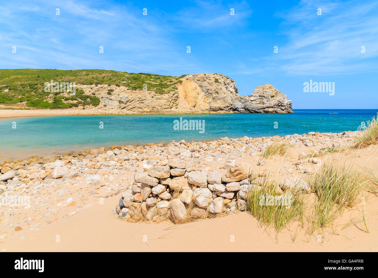 Stones on beautiful sandy Barranco beach, Portugal Stock Photo