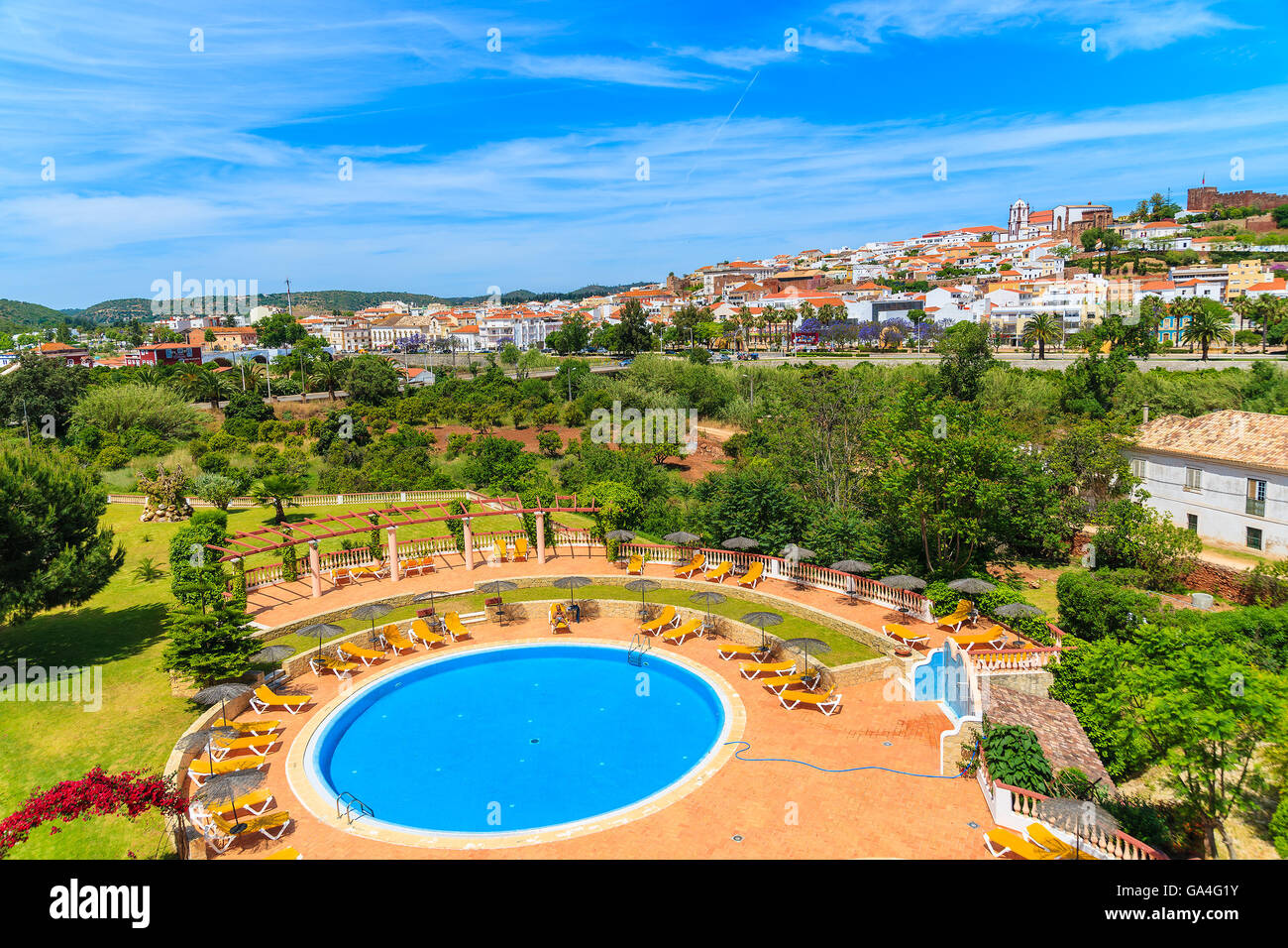 A view of Silves town buildings and pool of luxury hotel, Algarve region, Portugal Stock Photo