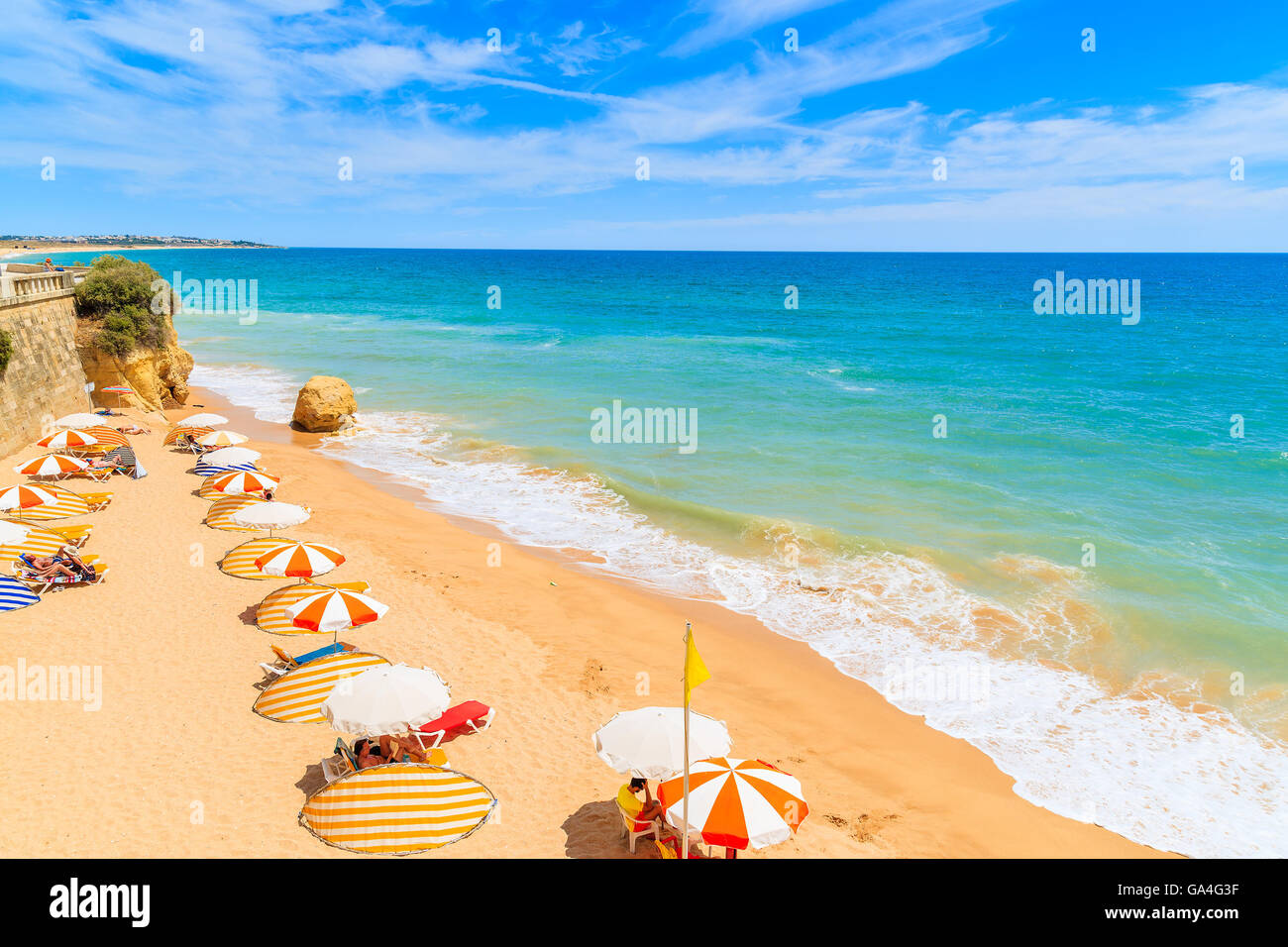A view of beautiful sandy beach in Armacao de Pera seaside town, Algarve region, Portugal Stock Photo