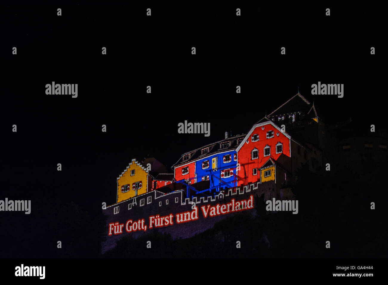 Vaduz National Day of Liechtenstein : projection of the country's motto 'Für Gott, Fürst und Vaterland' ' For God , Prince and F Stock Photo