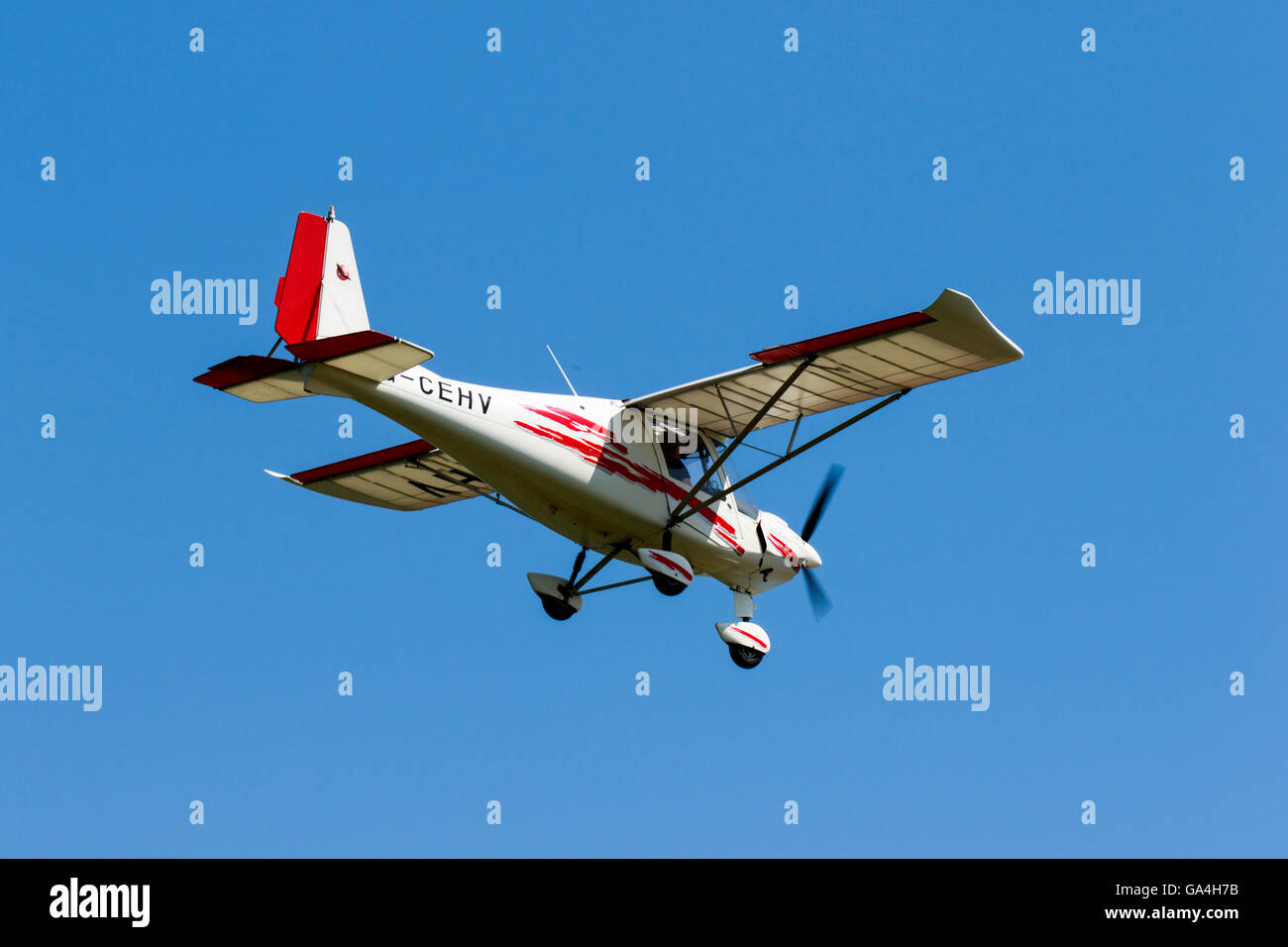 Ikarus C42 FB80 G-CEHV landing at Sturgate Airfield Stock Photo