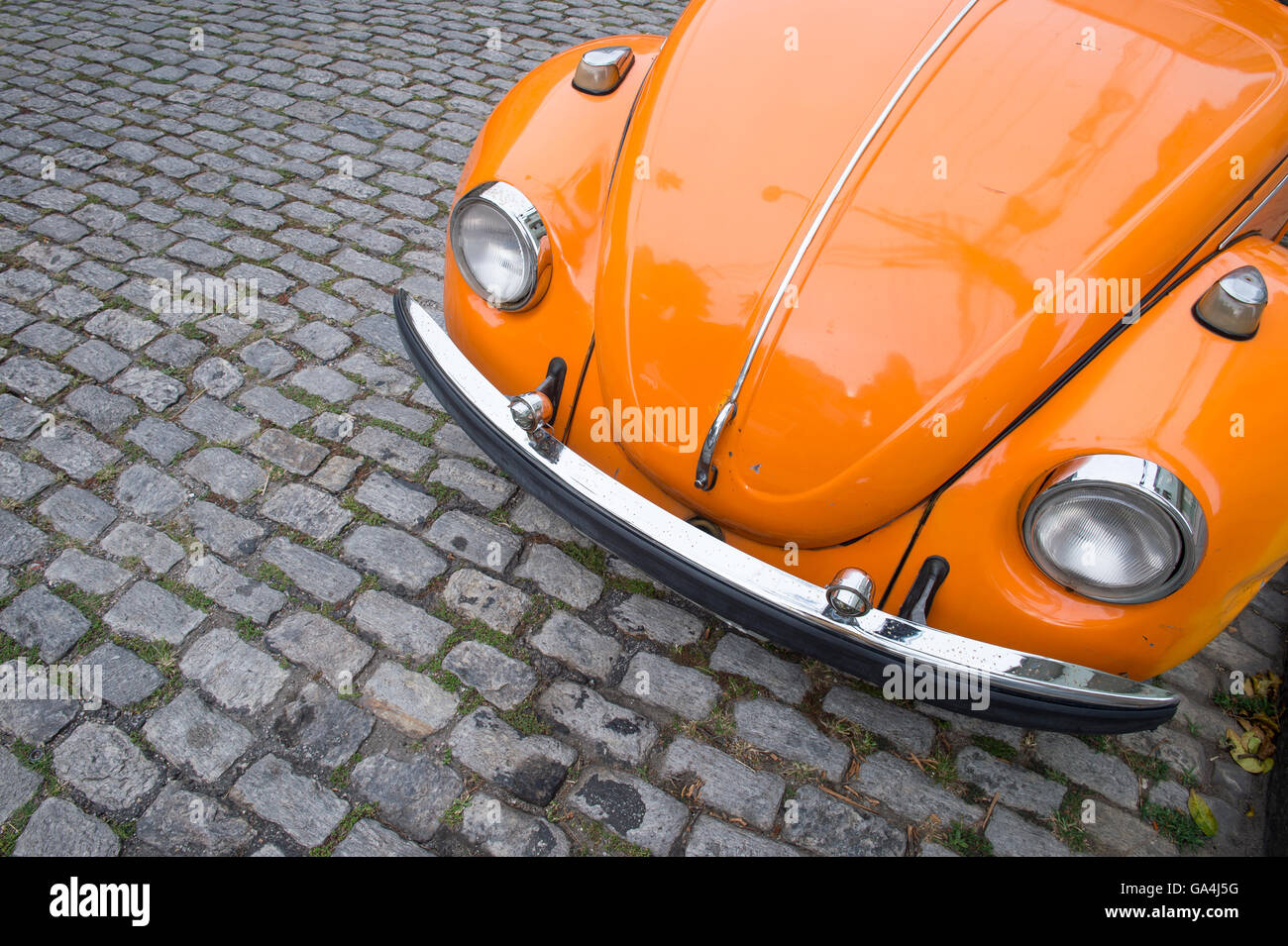 RIO DE JANEIRO - MARCH 24, 2016: Classic bright orange Volkswagen Type 1 Beetle, known locally as a Fusca, in Santa Teresa. Stock Photo