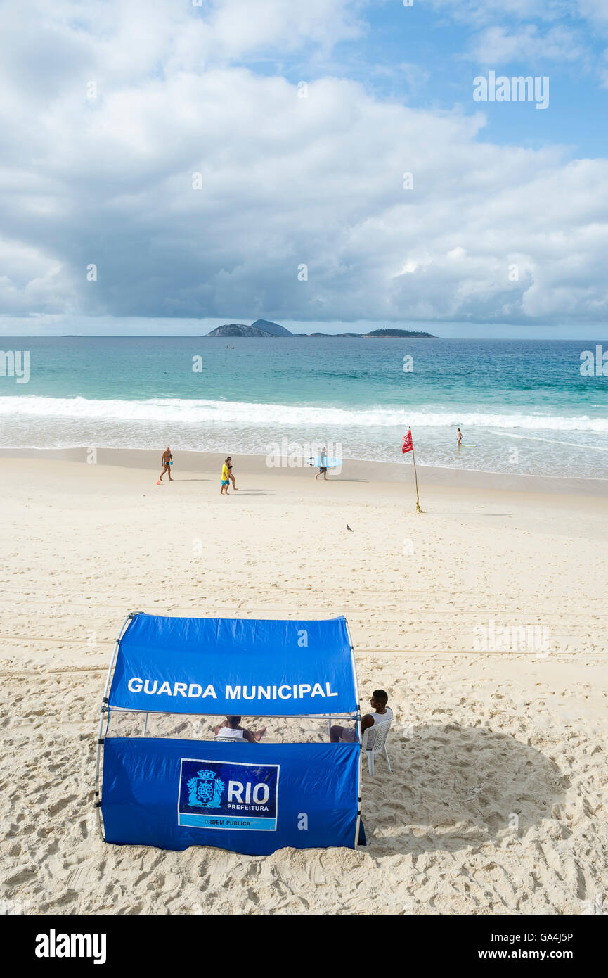 RIO DE JANEIRO - OCTOBER 22, 2015: Tent for the Guarda Municipal, a city security force, stands on Ipanema Beach. Stock Photo