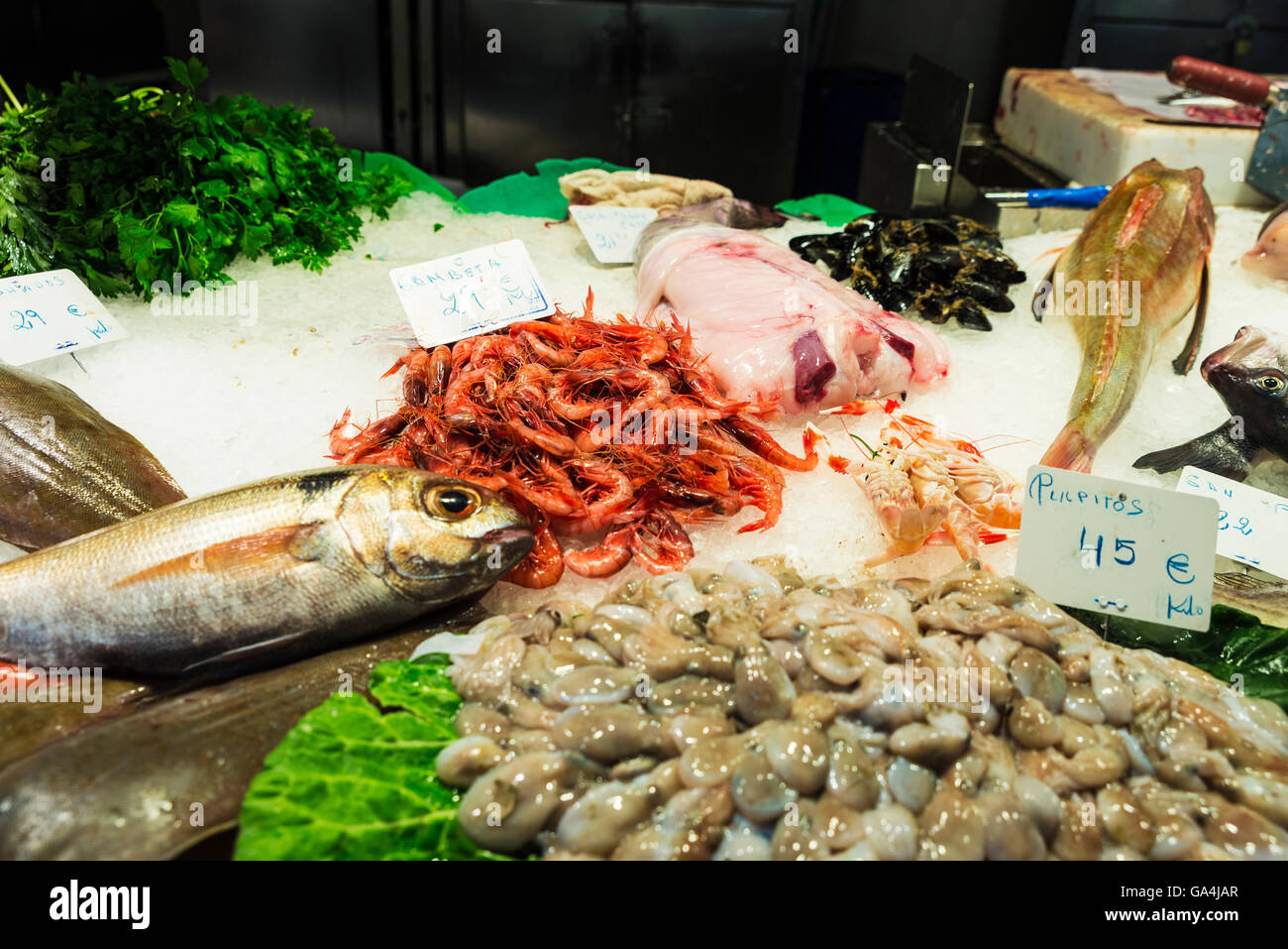 Fish and seafood shop on the market of La Boqueria, next to Les Rambles