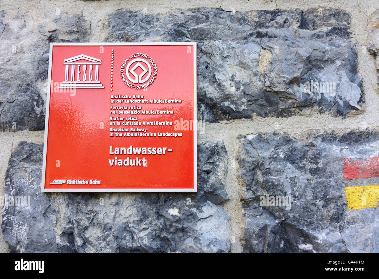 Filisur Sign for World Heritage on Landwasserviadukt of the Albulabahn over the stream Landwasser Switzerland Graubünden, Grison Stock Photo