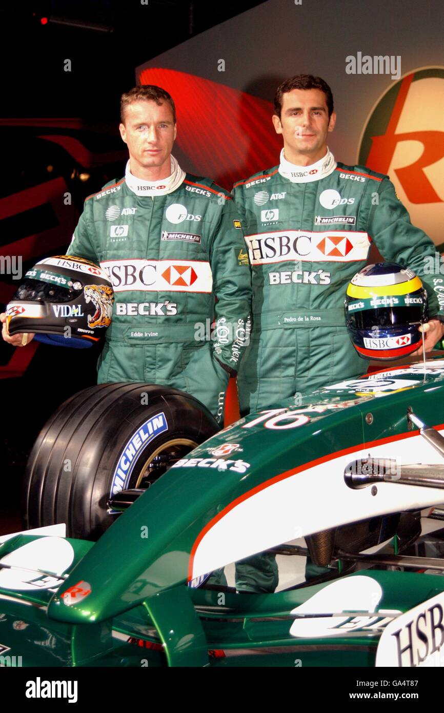 Eddie Irvine and Pedro De La Rosa at the launch of the 2002 Jaguar R3 car at the team's factory Stock Photo