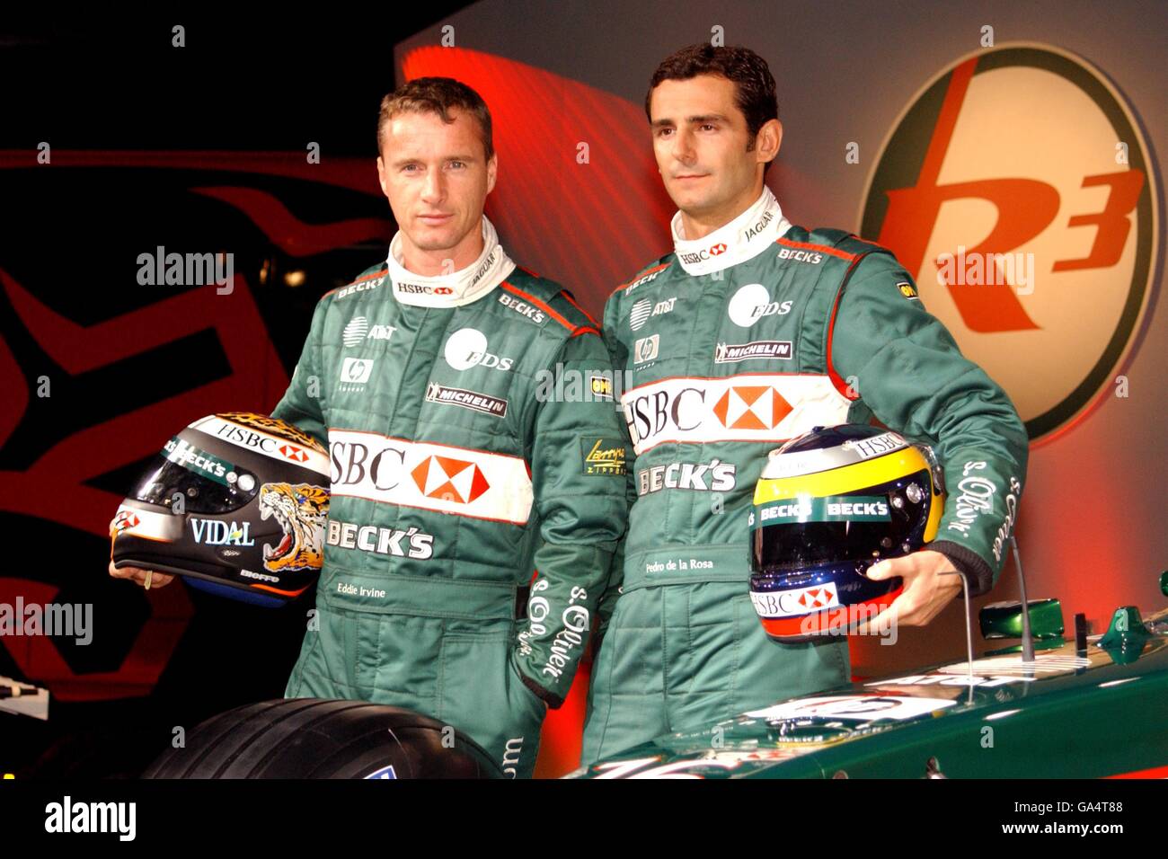 Eddie Irvine and Pedro De La Rosa at the launch of the 2002 Jaguar R3 car at the team's factory Stock Photo