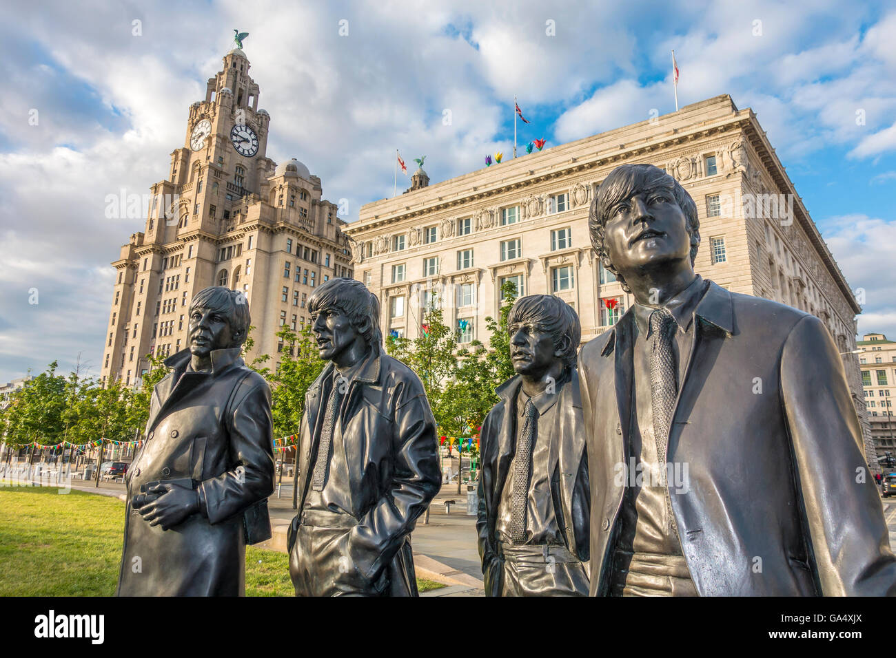 The Beatles Statue by Andrew Edwards Pier Head Liverpool UK Stock Photo