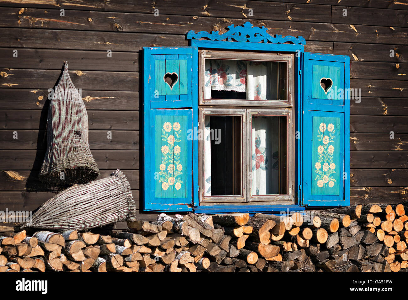 old wooden house in the country with blue shutters Stock Photo - Alamy